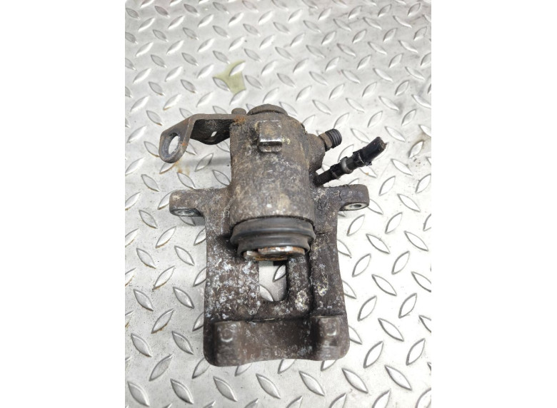 Суппорт задний левый к Volkswagen Golf, 2000г.