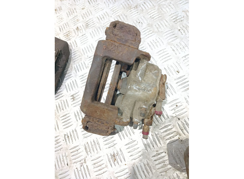 Суппорт передний левый к Lada 2121 Niva