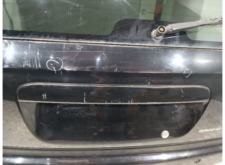 Накладка подсветки номера к Chrysler Voyager, 2004г.