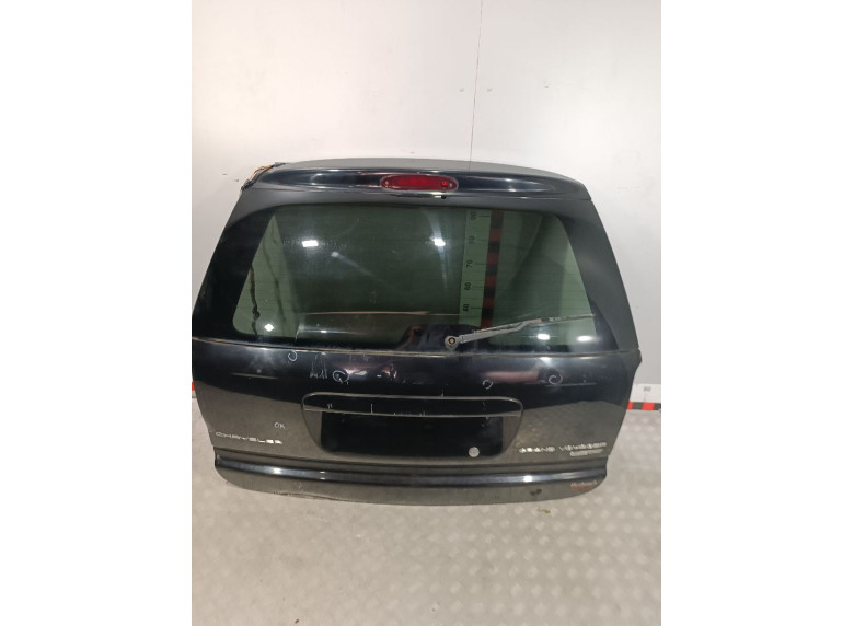 Накладка подсветки номера к Chrysler Voyager, 2004г.