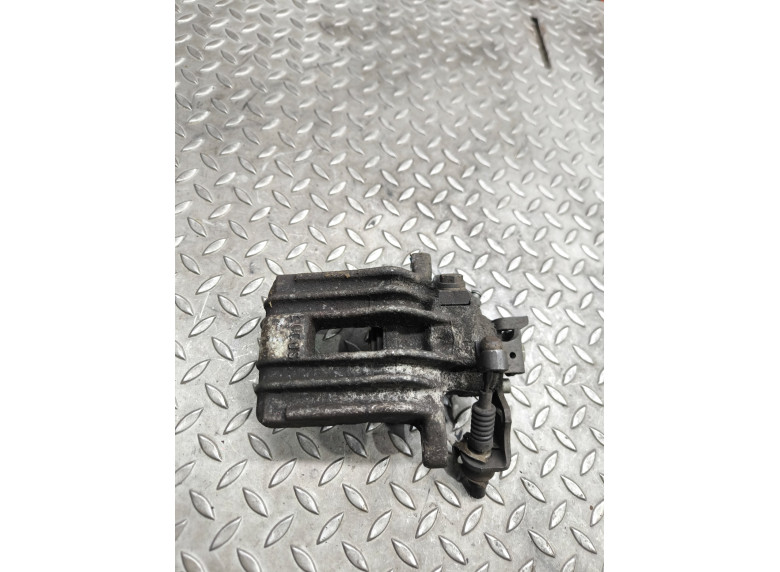 Суппорт задний левый к Volkswagen Golf, 2000г.