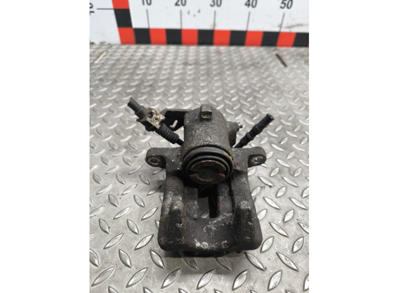 Суппорт задний левый к Volkswagen Golf, 2000г.