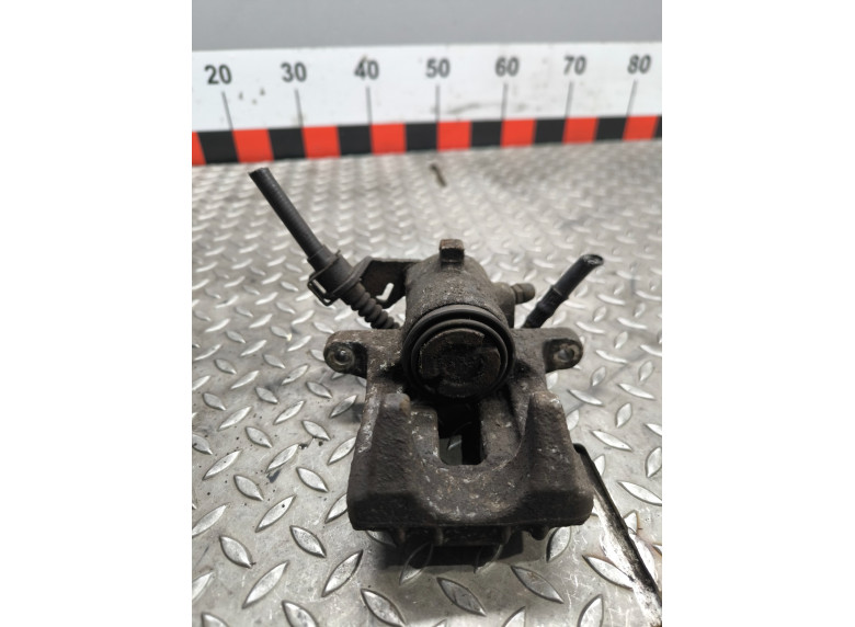 Суппорт задний левый к Volkswagen Golf, 2000г.