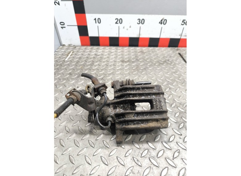 Суппорт задний левый к Seat Leon