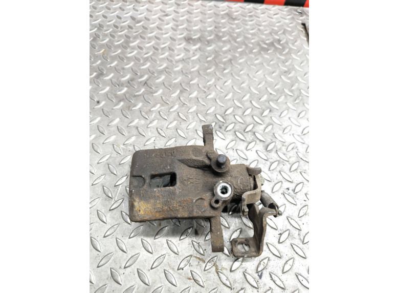 Суппорт задний левый к Kia Carens