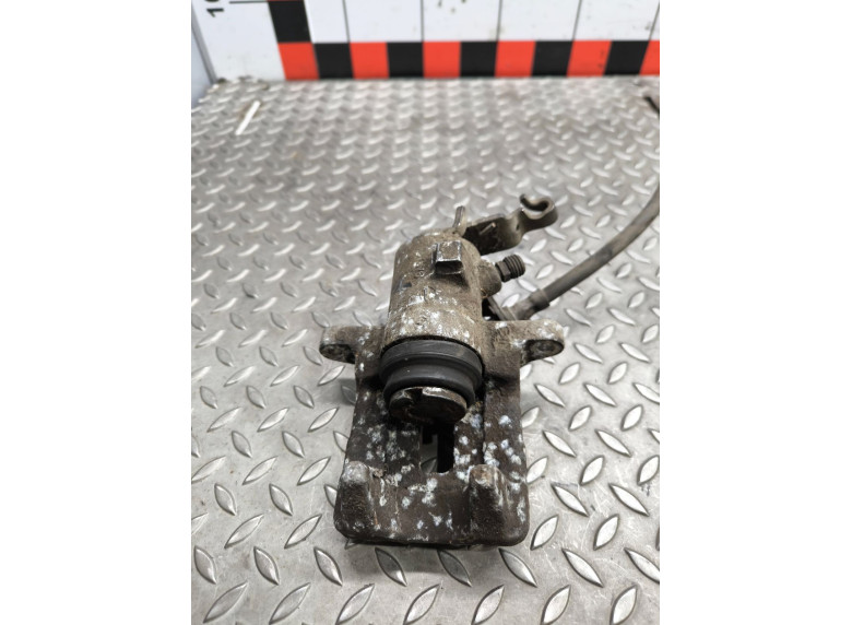 Суппорт задний правый к Volkswagen Golf, 2006г.