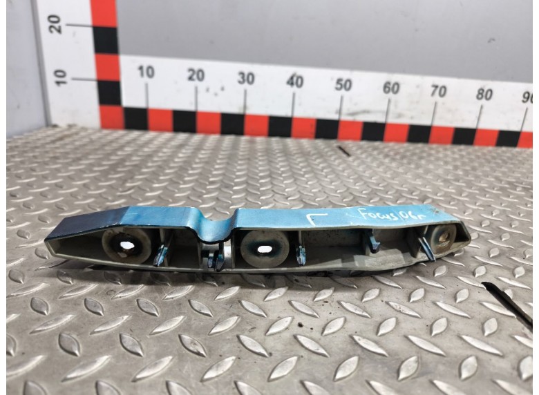 Кронштейн крепления бампера переднего к Ford Focus
