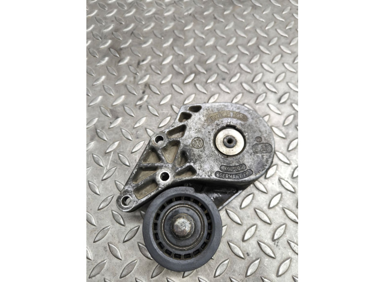 Натяжитель ремня генератора к Volkswagen Passat, 1995г.