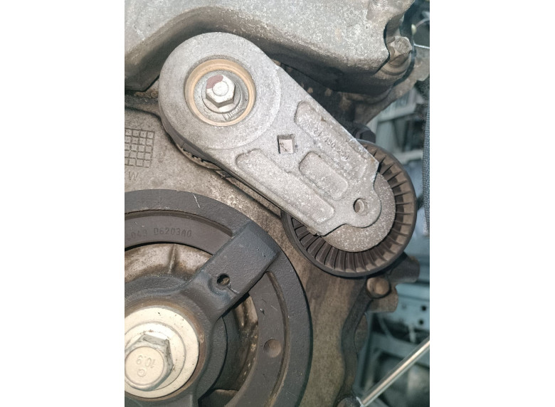 Натяжитель ремня генератора к Opel Zafira, 2006г.