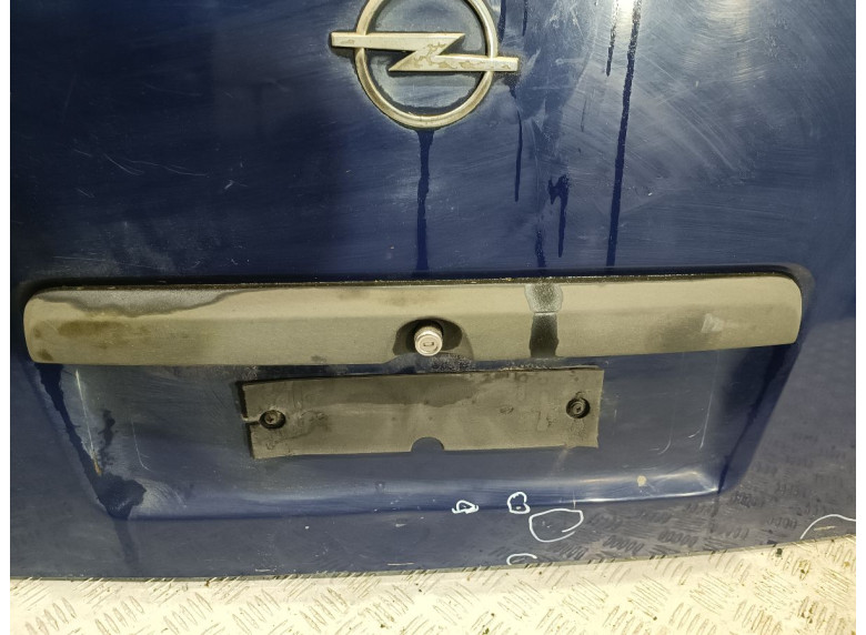 Накладка подсветки номера к Opel Combo, 2005г.