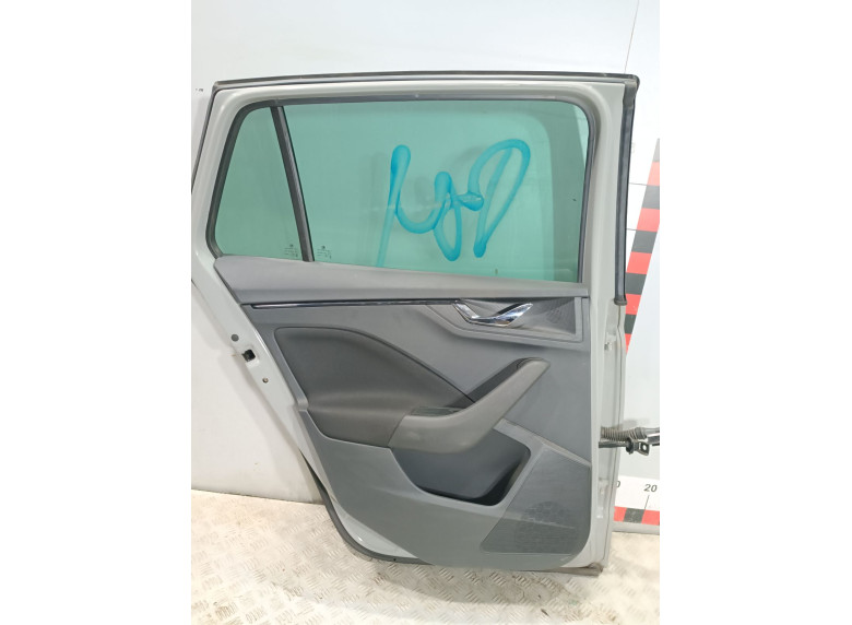 Обшивка двери задней левой (дверная карта) к Skoda Scala