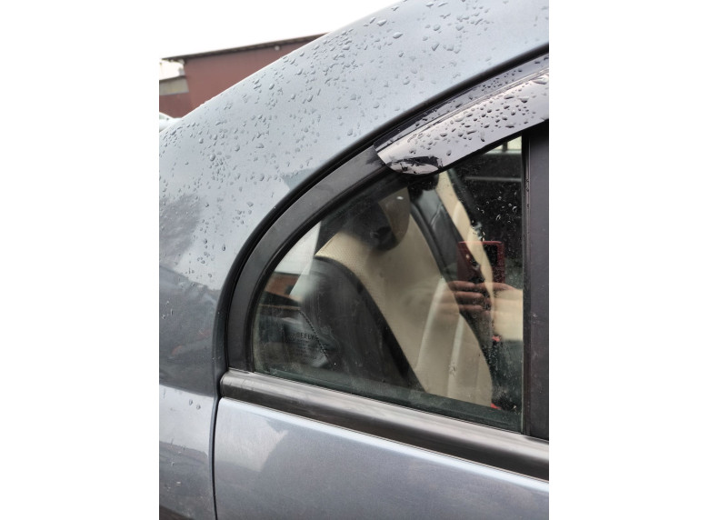 Стекло двери задней правой к Geely Emgrand 7