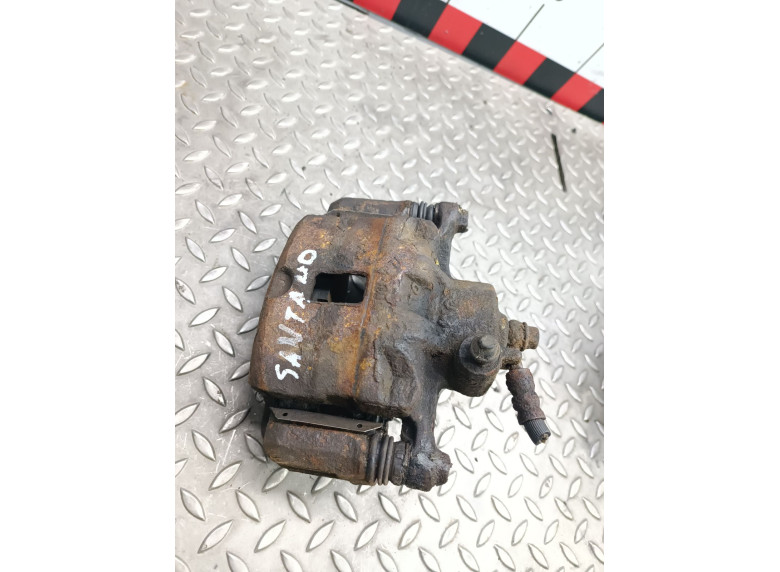 Суппорт передний левый к Hyundai Santamo