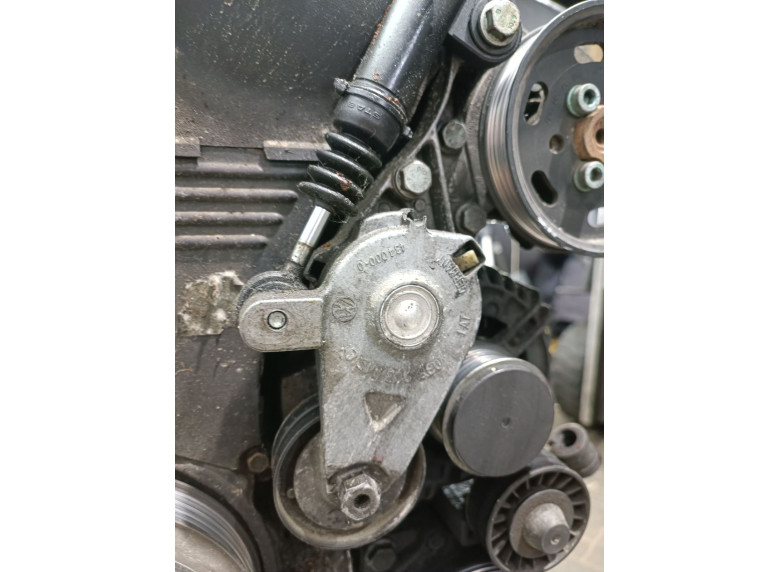 Натяжитель ремня генератора к Volkswagen Golf, 1999г.