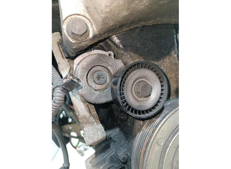 Натяжитель ремня генератора к Opel Astra, 2007г.