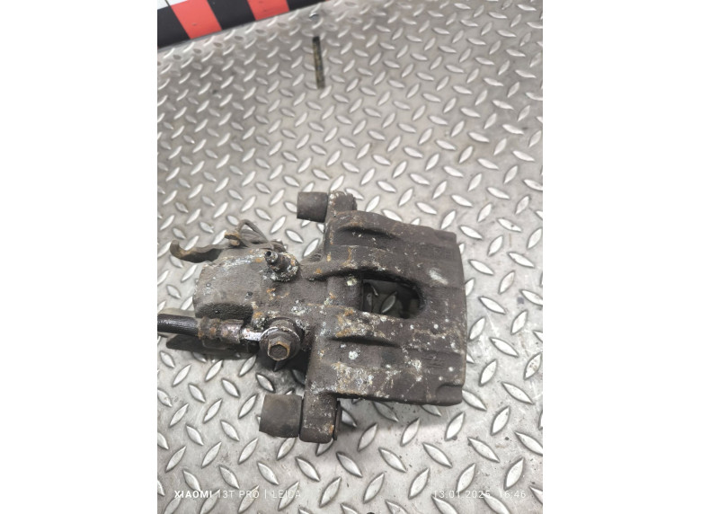 Суппорт задний правый к Nissan Primera