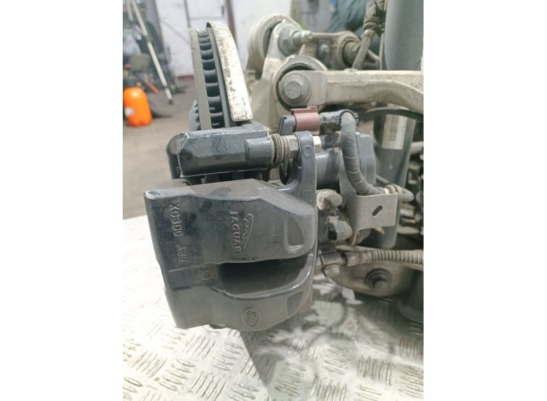 Суппорт задний левый к Land-Rover Range Rover