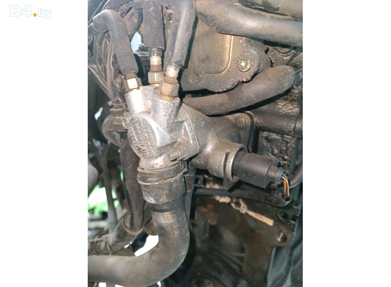 Фланец (тройник) системы охлаждения к Volkswagen Passat undefined г.