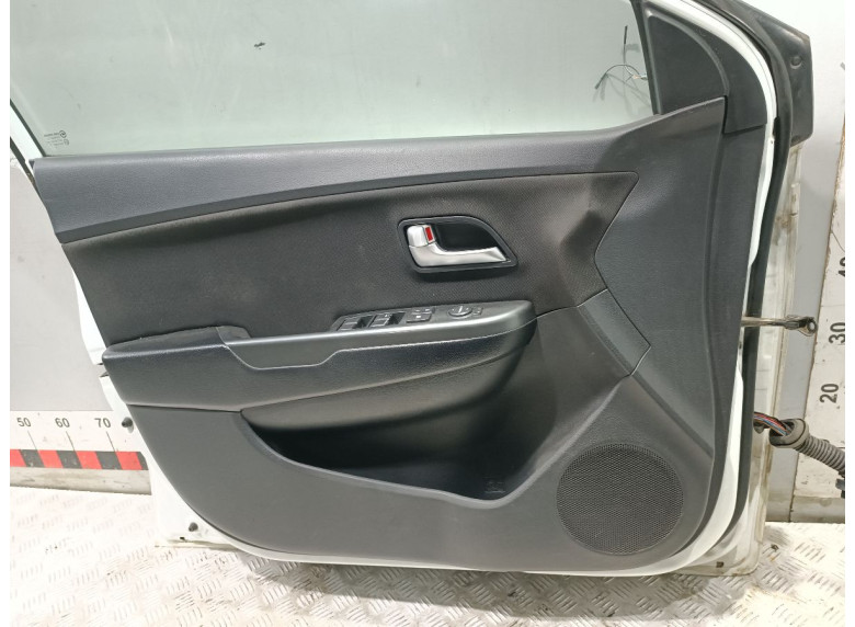 Обшивка двери передней левой (дверная карта) к Kia Rio