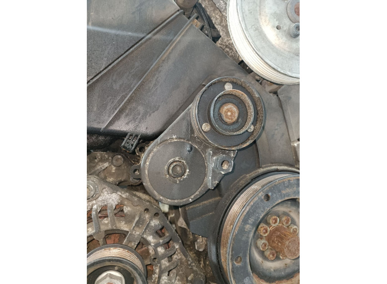 Натяжитель ремня генератора к Volkswagen Passat, 1999г.