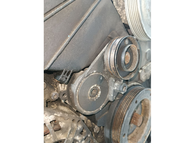 Натяжитель ремня генератора к Volkswagen Passat, 1999г.