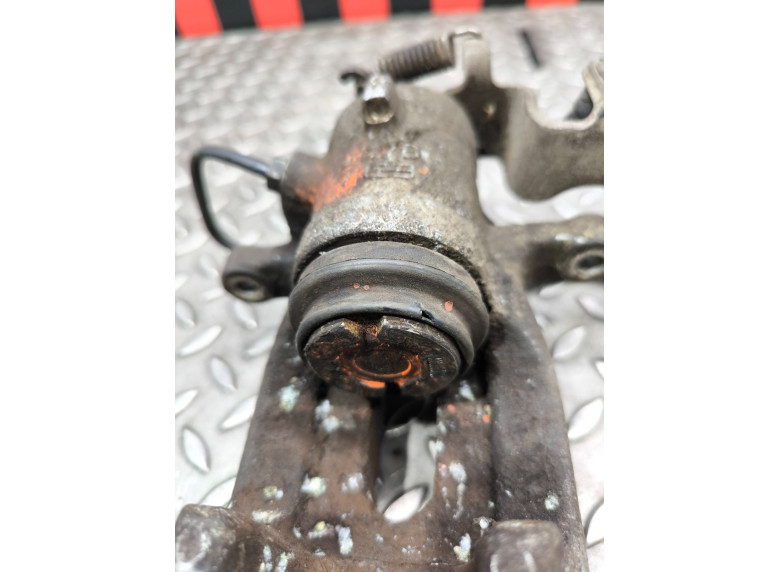 Суппорт задний левый к Citroen Berlingo, 2009г.