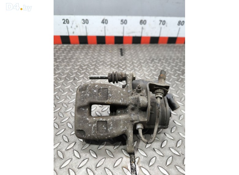 Суппорт задний правый к Volkswagen Passat undefined г.