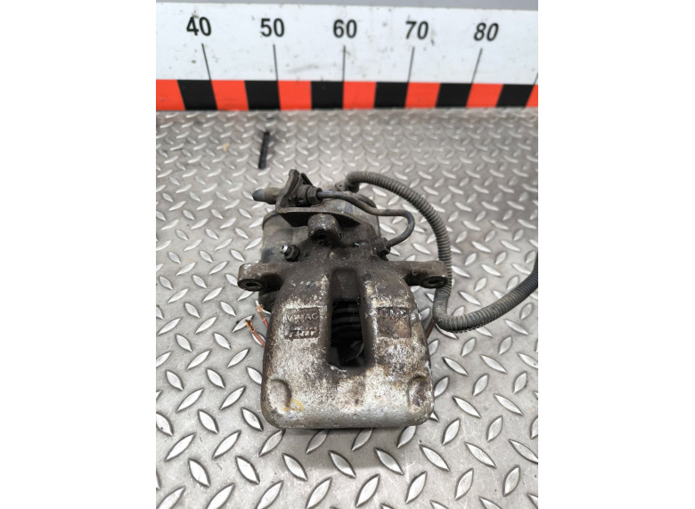 Суппорт задний правый к Volkswagen Passat, 2008г.