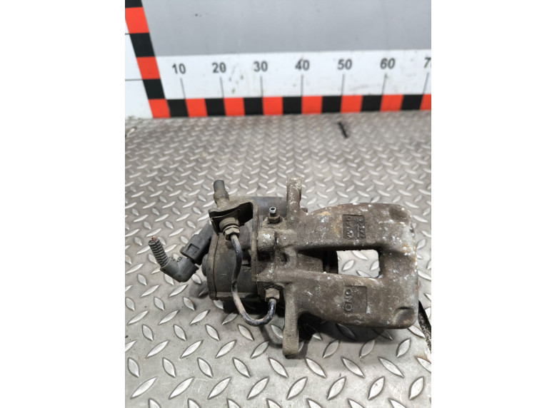 Суппорт задний левый к Volkswagen Passat, 2008г.