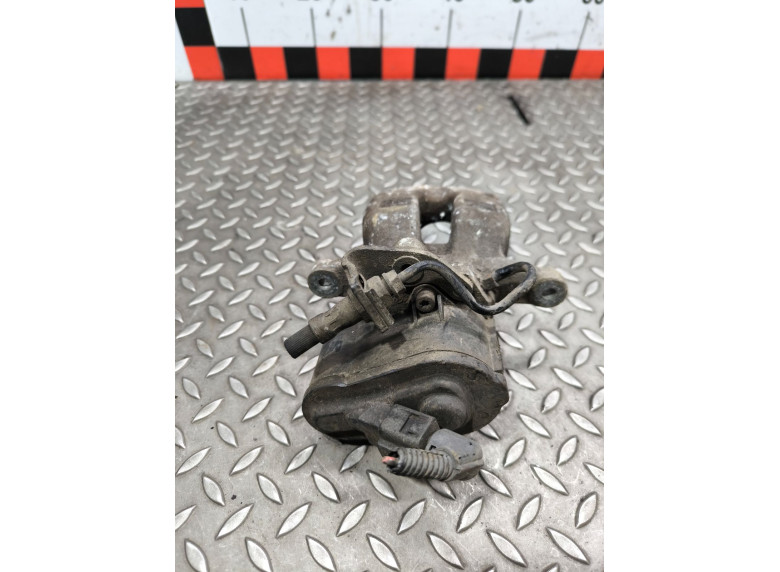 Суппорт задний левый к Volkswagen Passat, 2008г.