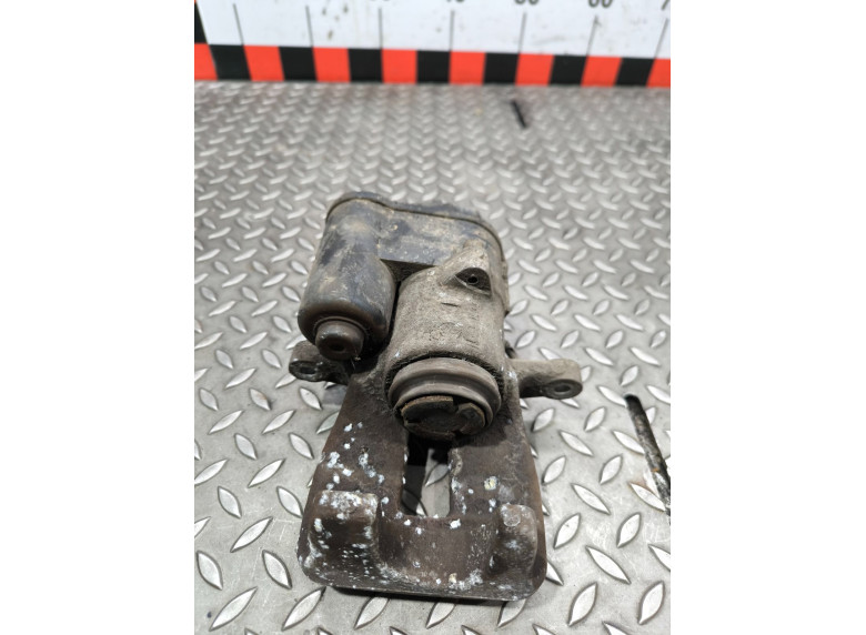 Суппорт задний левый к Volkswagen Passat, 2008г.