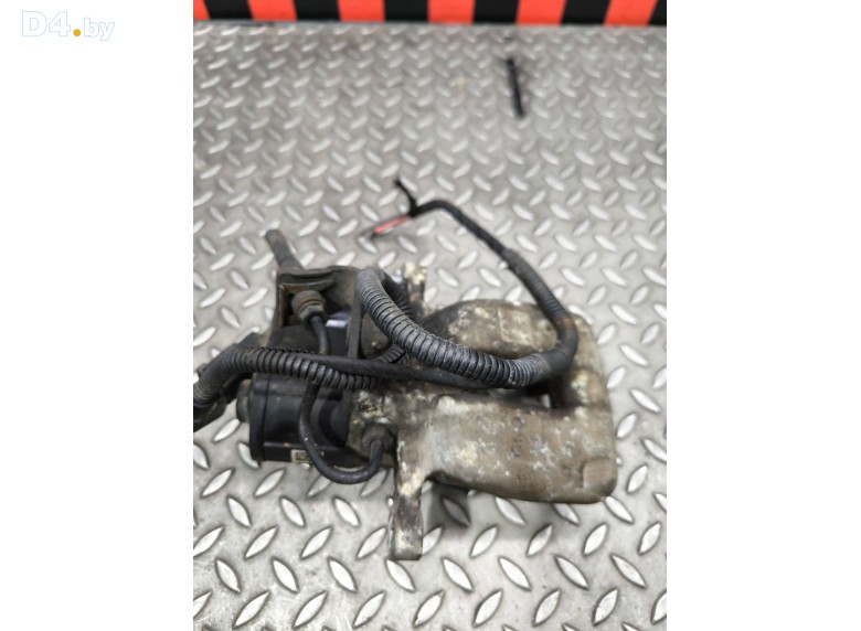 Суппорт задний левый к Volkswagen Passat undefined г.