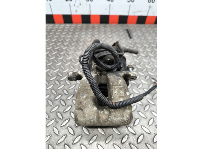 Суппорт задний левый к Volkswagen Passat, 2008г.