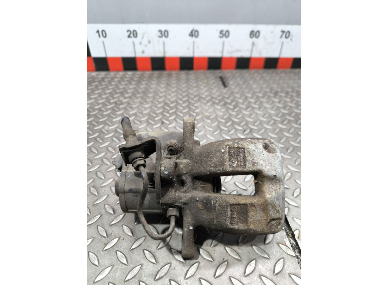 Суппорт задний левый к Volkswagen Passat, 2008г.