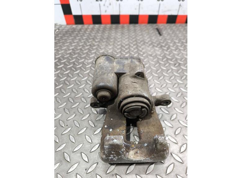 Суппорт задний левый к Volkswagen Passat, 2008г.