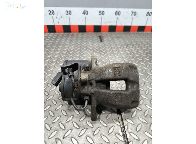 Суппорт задний левый к Volkswagen Passat undefined г.