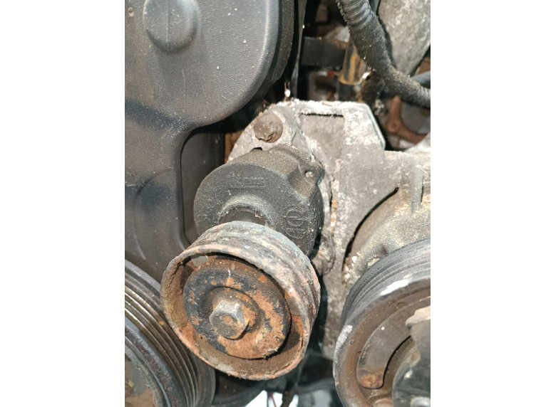 Натяжитель ремня генератора к Opel Astra, 2004г.