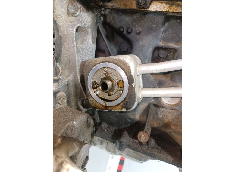 Теплообменник масляного фильтра к Volkswagen Golf, 2001г.