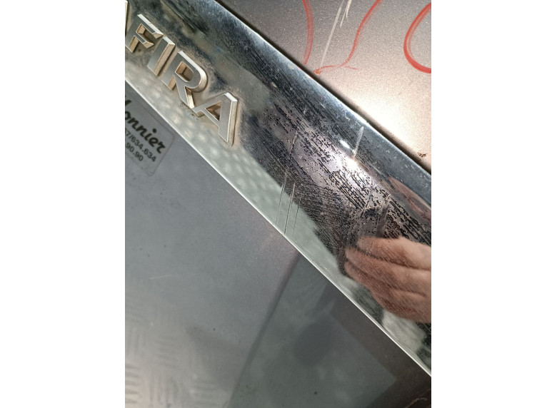 Накладка подсветки номера к Opel Zafira, 2009г.