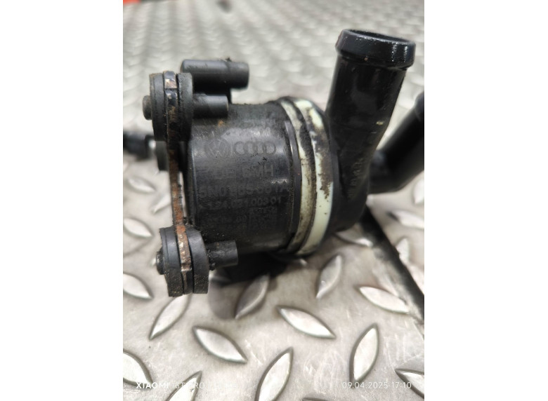 Насос антифриза дополнительный к Volkswagen Passat, 2009г.