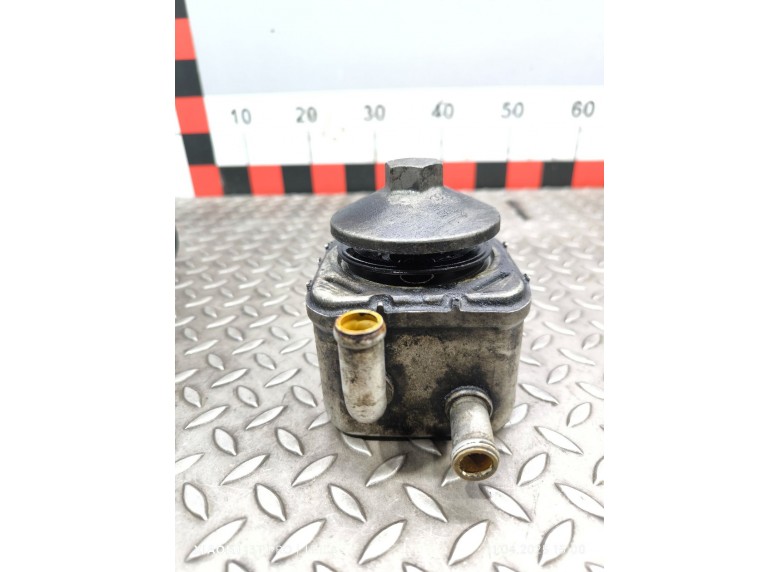 Теплообменник масляного фильтра к Audi A6 undefined г.