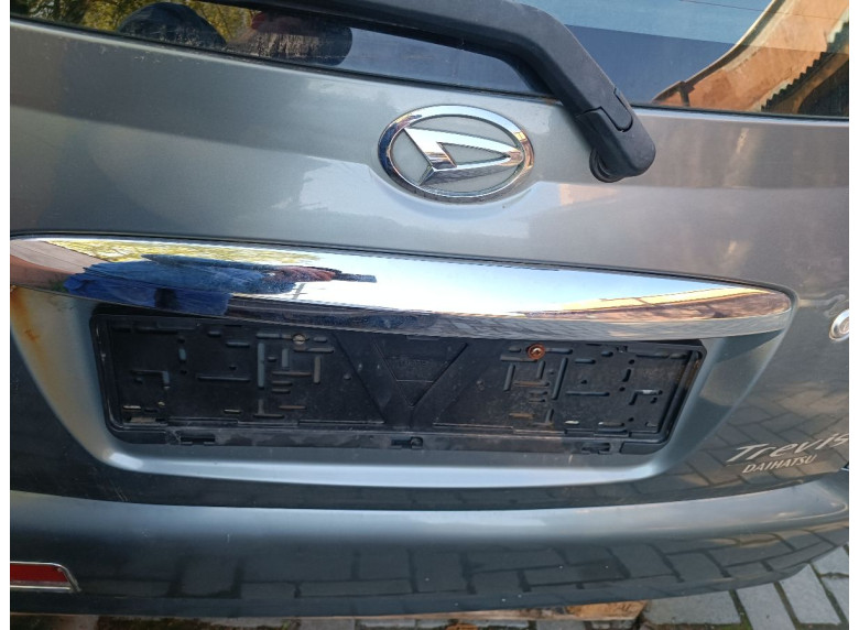 Накладка подсветки номера к Daihatsu Trevis, 2007г.