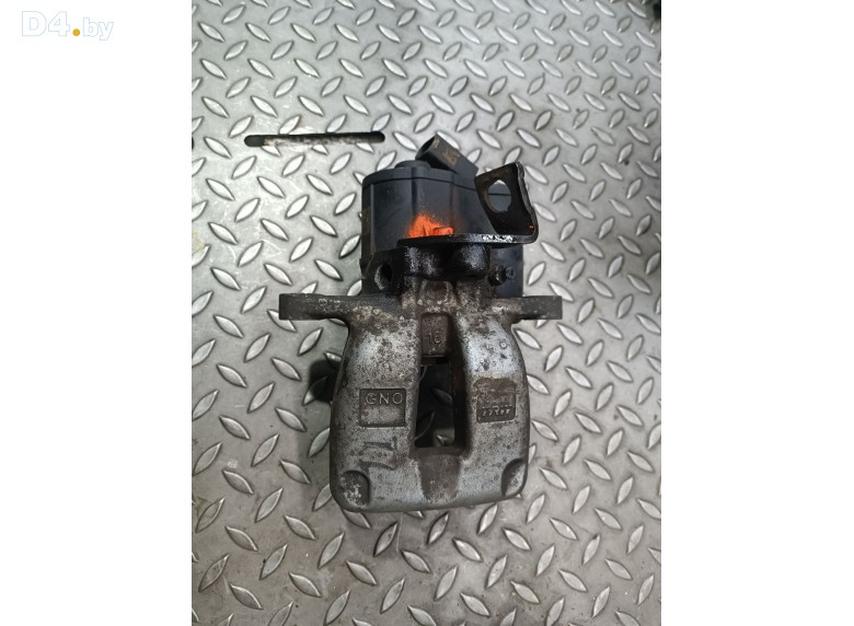 Суппорт задний левый к Volkswagen Passat undefined г.