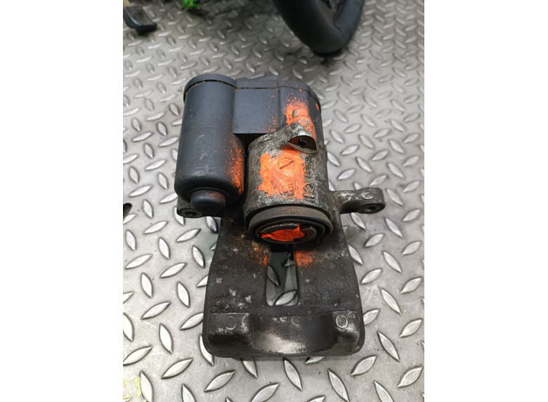 Суппорт задний левый к Volkswagen Passat, 2008г.