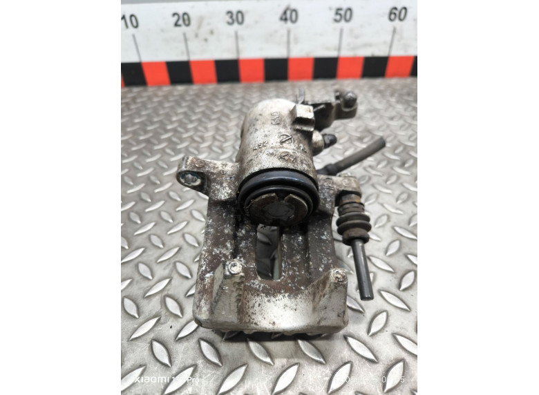 Суппорт задний правый к Volkswagen Golf, 2006г.