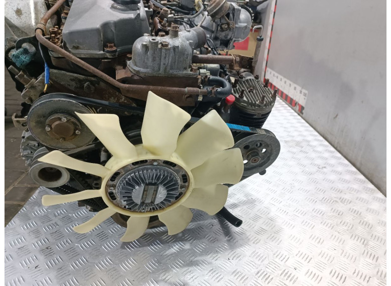 Двигатель к Двигатель к Isuzu Elf undefined г. Elf