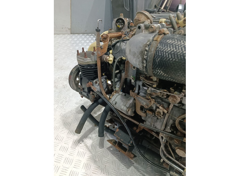 Двигатель к Двигатель к Isuzu Elf undefined г. Elf