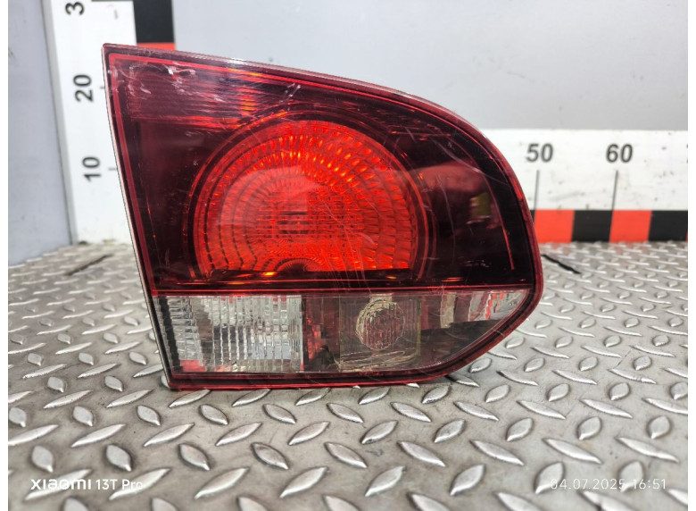 Фонарь крышки багажника левый к Volkswagen Golf, 2009г.