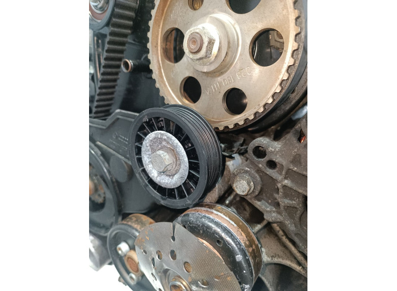 Натяжитель ремня генератора к Volkswagen Passat, 1999г.