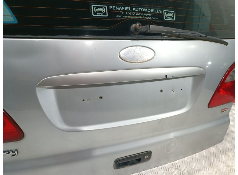 Накладка подсветки номера к Ford Galaxy, 2003г.